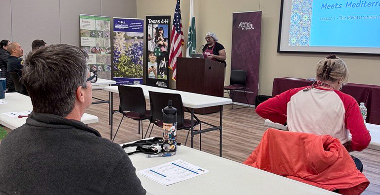 The instructor teaches the Mediterranean cooking class on Dec. 5, 2025.
