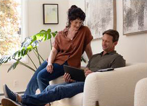 photo of a man and woman discussing their financial future.